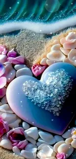 Heart-shaped stone and flower arrangement on sandy beach with ocean view.