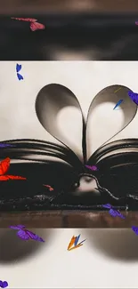 Book pages form a heart, surrounded by colorful butterflies.