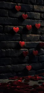 Red hearts on a dark brick wall for a romantic mobile wallpaper.