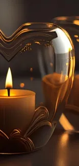 Heart-shaped glass candle holder with a glowing flame, casting a warm reflection.