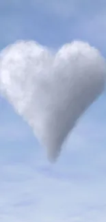 Heart-shaped cloud floating in a light blue sky, perfect for a serene mobile wallpaper.