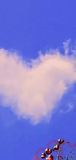 Heart-shaped cloud in blue sky wallpaper with love theme.