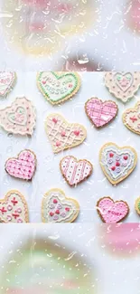 Heart-shaped cookies with colorful icing on a pastel background.