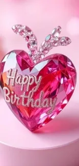 Heart-shaped pink crystal with glittery birthday message.