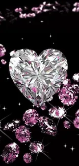 Heart-shaped diamond and pink gems on a black background wallpaper.