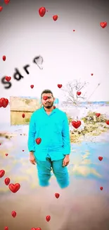 Man in blue shirt surrounded by red hearts by a lakeside.