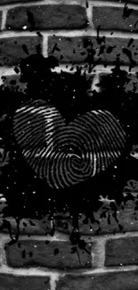 Heart fingerprint art on dark brick wall background.