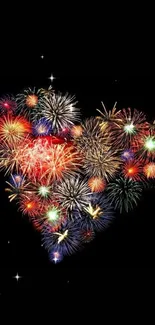 Heart-shaped colorful fireworks on black background, perfect for mobile wallpaper.