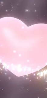 Glowing pink heart with sparkling stars in galaxy-themed wallpaper.