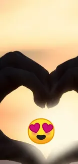 Hands forming a heart shape at sunset.