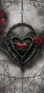 Heart in barbed wire with red flowers on mobile wallpaper.