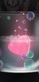 Pink heart encased in a glass sphere with bubbles, on a dark background.