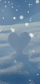 Heart-shaped snow with falling snowflakes on a light blue winter background.