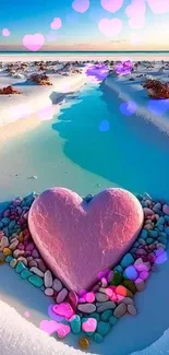 Pink heart on snow with colorful pebbles in serene landscape.