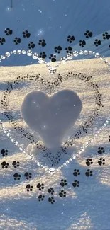 Heart-shaped snow in golden sunrise with intricate patterns and paw prints.