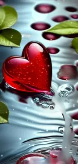 Red heart floating on water with green leaves.