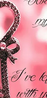 Heart-shaped key on pink background with romantic text.