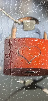 Heart-shaped padlock with raindrops on glass.