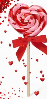 Heart-shaped lollipop with red hearts design.