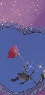 Heart-shaped mirror with a red rose reflection on purple.