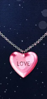 Mobile wallpaper with heart necklace and dark blue background.