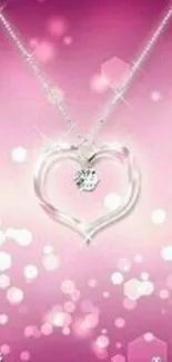 Pink heart necklace with sparkle effect on mobile wallpaper.