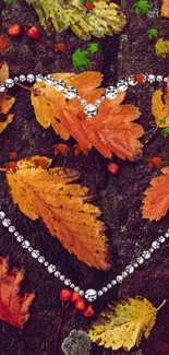 Colorful autumn leaves with heart shape stones.