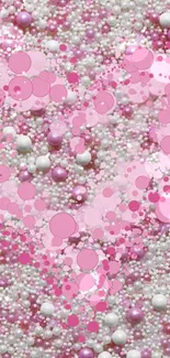 Mobile wallpaper with a heart of pink bubbles on a textured background.