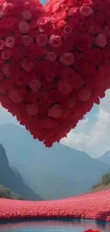 Heart-shaped rose arrangement with mountains in the background.