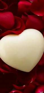 Heart on red rose petals wallpaper for mobile.