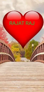 Heart on scenic autumn bridge wallpaper with vivid colors.