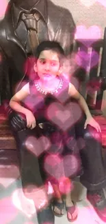 Child sitting on a bench with heart overlay background.