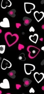 Pink, white, and black heart pattern wallpaper.