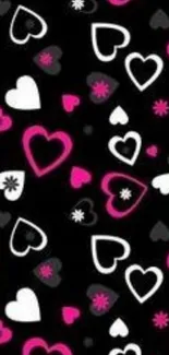 Vibrant heart pattern wallpaper with pink, white, and black design.