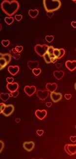 Red and yellow glowing heart pattern wallpaper for mobile.