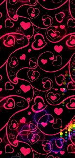 Stylish pink and black heart pattern wallpaper for mobile screens.