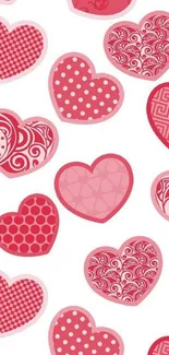 A heart pattern phone wallpaper with red and pink designs on a white background.