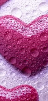 Pink heart wallpaper with water droplets for a textured, romantic design.