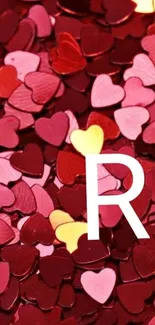 Red heart pattern wallpaper with letter R.