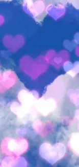 Dreamy mobile wallpaper with purple hearts and a blue background.