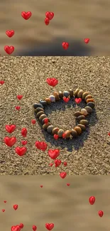 Heart-shaped pebbles on sand with red hearts mobile wallpaper.