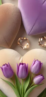 Heart-shaped pillows with purple tulips create a cozy wallpaper.