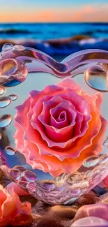 Heart-shaped glass with pink rose against a beach backdrop.