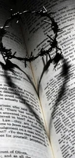 Heart shadow formed by a ring on an open book page.