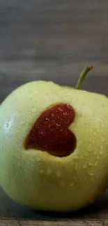 Heart-shaped apple with dewdrop detail.