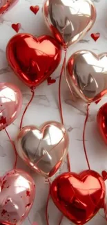 Heart-shaped red and silver balloons wallpaper.