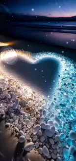 Heart-shaped stones glowing on a sandy beach at night with ocean waves.