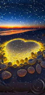 Heart-shaped sand surrounded by glowing pebbles at beach sunset.