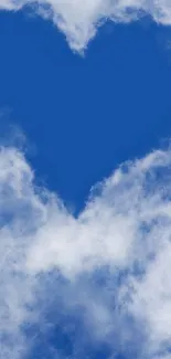 Heart-shaped clouds in bright blue sky wallpaper.