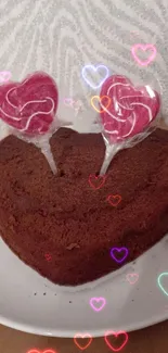 Heart-shaped chocolate cake with lollipops.